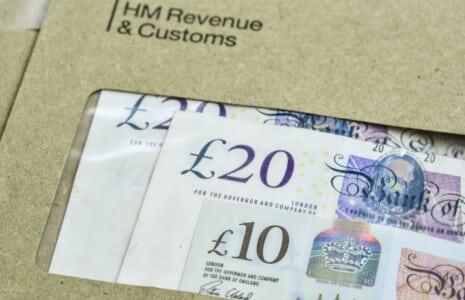 Revenue and Customs on envelope, with money