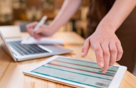 female accountant using accounting software for tax