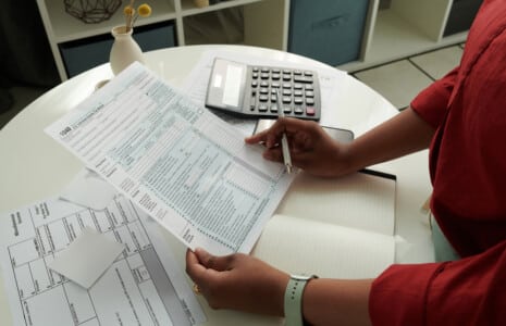 woman-calculating-her-domestic-tax
